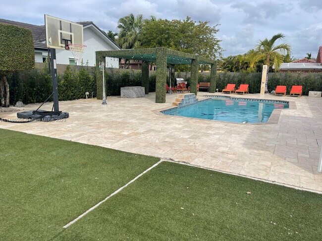 Building Photo - 6790 SW 105th Ave