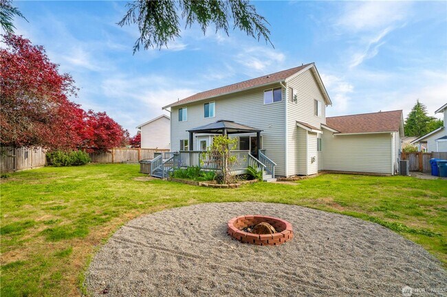 Building Photo - Enjoy this 3 bedroom, 2.5 bath home in the gated community of Stonerise