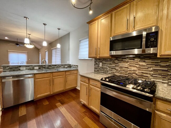 Building Photo - 3-Story Duplex in Chesapeake Beach! Ready 05-06-26! Fenced Backyard - Attached Garage - Pet Frien...