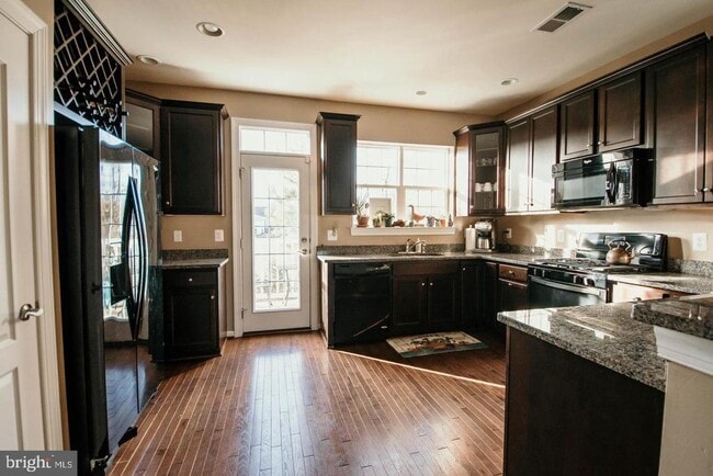Building Photo - 7454 Riding Meadow Way