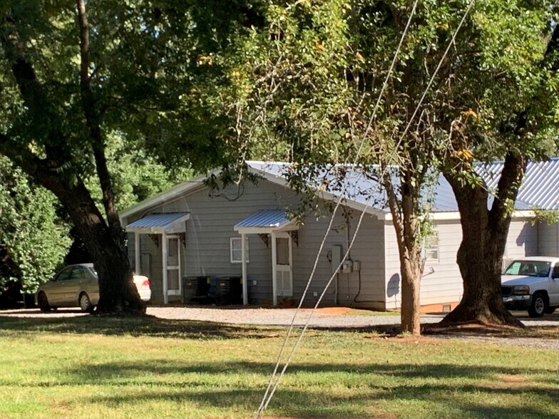 Back Door - 204 W College Ave