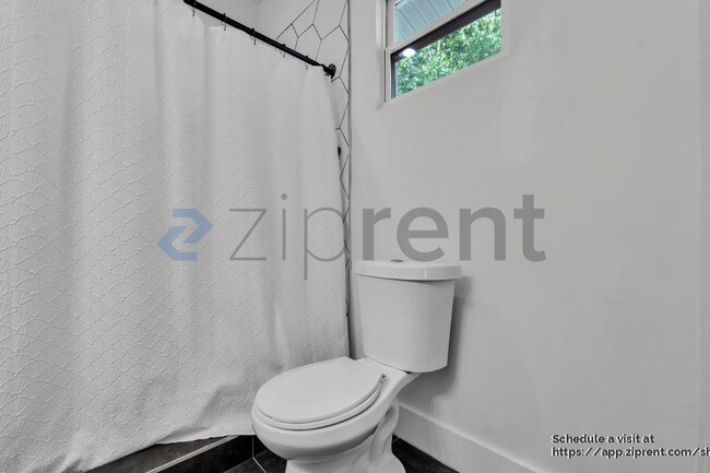 Building Photo - 3002 N Highland Ave