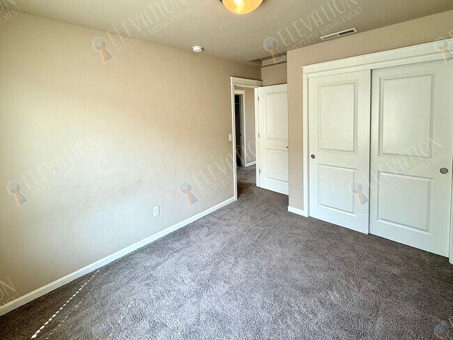 Building Photo - 63151 Black Powder Ln
