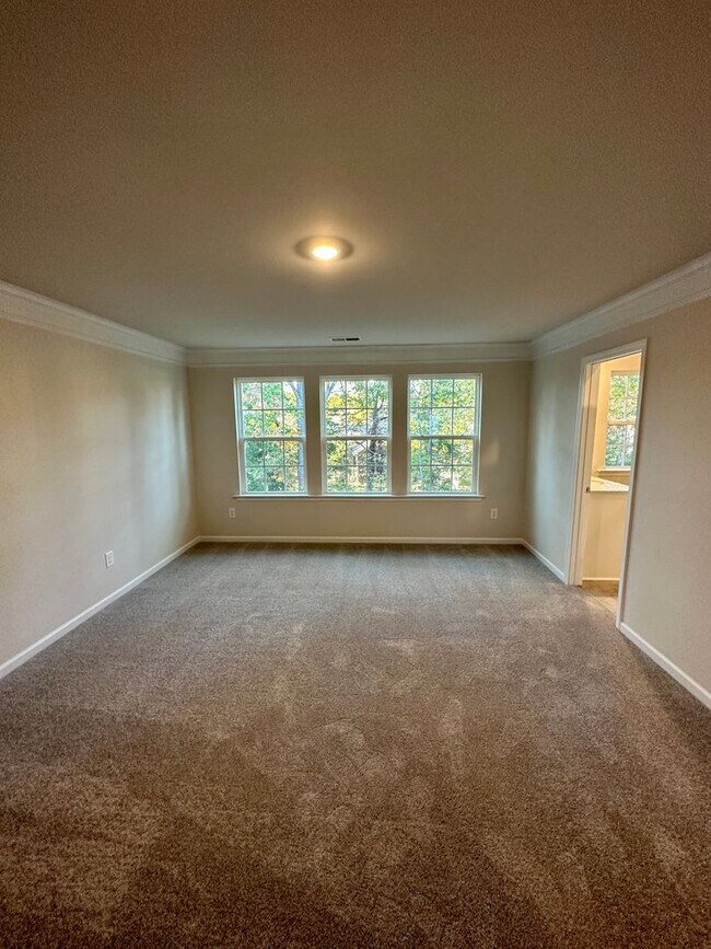 Building Photo - 4BR/3.5 Bath Townhouse in Prime Ballantyne Location; Great Schools