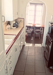 Kitchen leading to dining nook/room - 3438 Field Ave