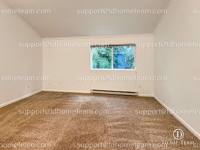 Building Photo - "Charming 2-Bed Townhouse with Spacious 12...
