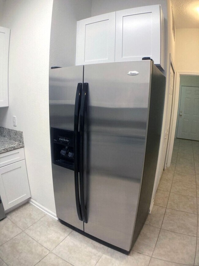 Building Photo - Spacious 3-Bedroom Condo with Pond Views &...
