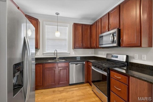 Building Photo - Welcome home to this bright and inviting 2-bedroom, 2-bathroom apartment on the second floor at 7...