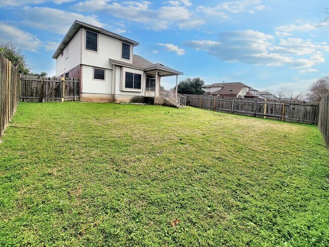 Building Photo - Inviting 3BR/2.5BA with Spacious Bedrooms & Great Outdoor Space