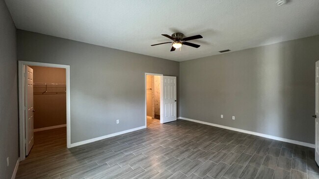 Building Photo - Smart & Stylish 3BD/2BA Palm Bay Home – Modern Upgrades, No Water Bills!