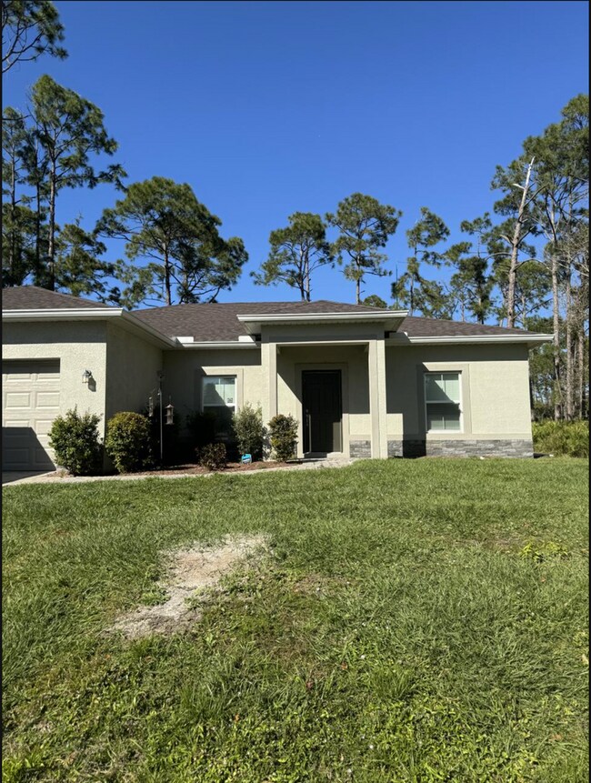 Building Photo - 3 Bedroom 2 Bathroom 2 Car Garage Home For Rent in North Port FL!