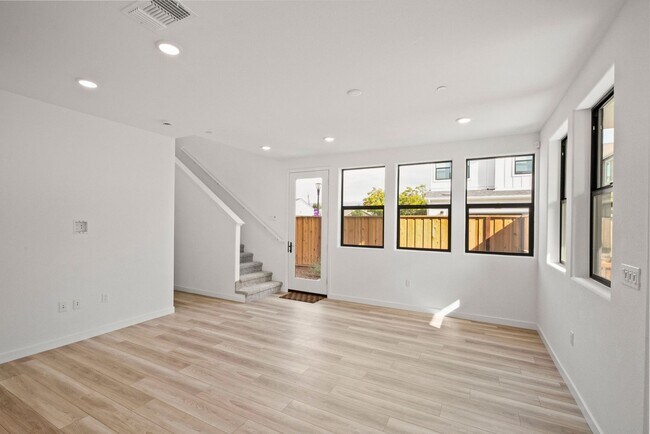 Building Photo - Modern Living in SOMO Village-Brand New 20...