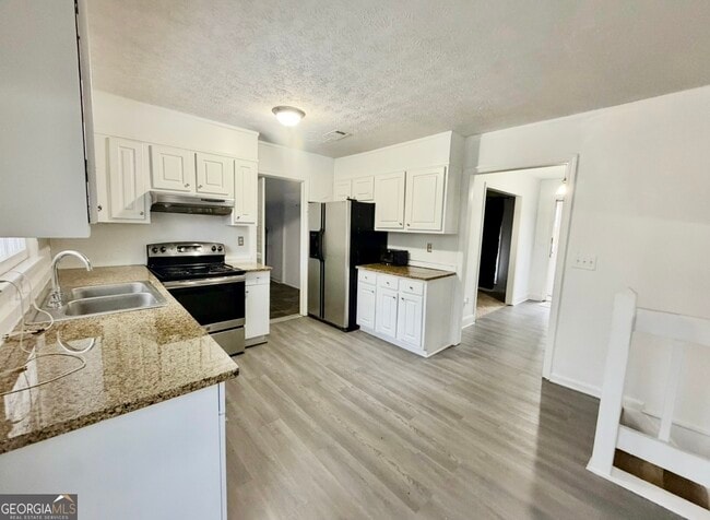 Building Photo - 975 Daisy Ct NW