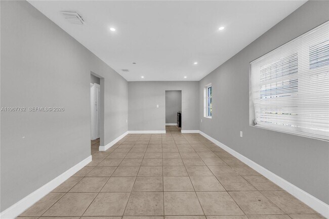 Building Photo - 6940 NW 6th Ct