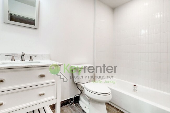 Building Photo - Modern New Construction 3 Bedroom Townhome with Garage & Driveway — First Occupancy!