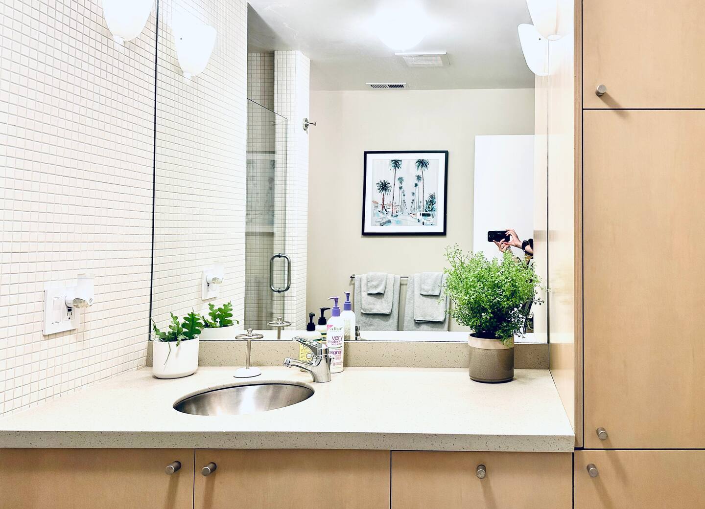 Downstairs bathroom has large tiled spa shower with both overhead shower head and 2 sinks & vanities - 328 Harriet St