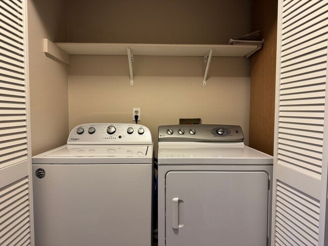 Building Photo - Serene Ground-Floor Condo Overlooking Green Space – Parking Included