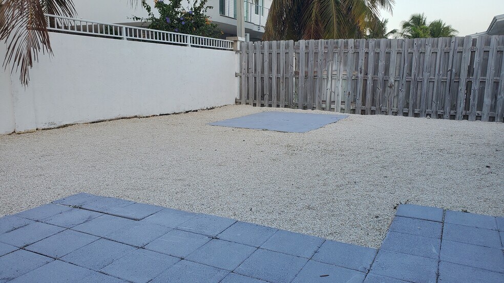 patios in yard - 603 124th Street Gulf