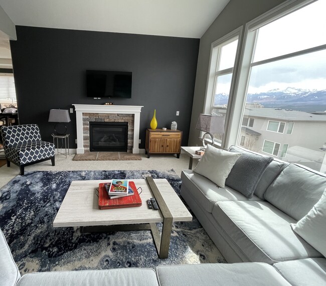 Living room- feel free to put your feet up on this table! - 1410 Promontory Bluff Vw