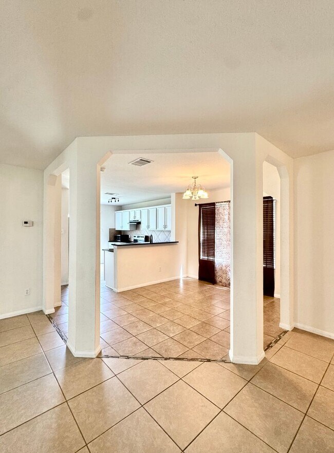 Building Photo - Spacious 5-Bedroom Home with In-Law Suite ...