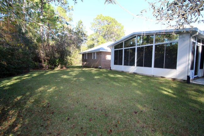 Building Photo - 4 bedroom 3 bathroom brick home in Gulf Br...