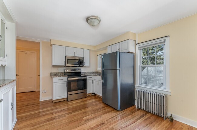 New kitchen, granite counters - 317 Washburn Ave