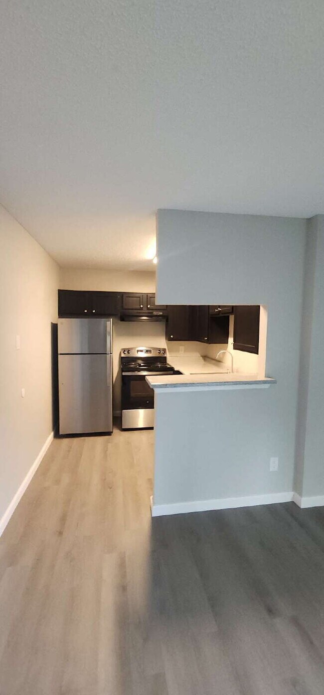 Building Photo - Charming 1-Bedroom Condo in Gated North Da...