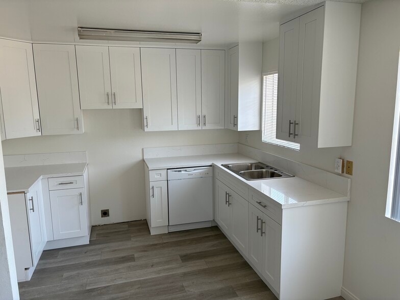 New Kitchen cabinets unit will come with DW and range. - 18071 Beneda Ln
