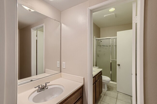 Building Photo - Freshly Updated 2-Bedroom Condo with Attached Garage in Gated Winnetka Community