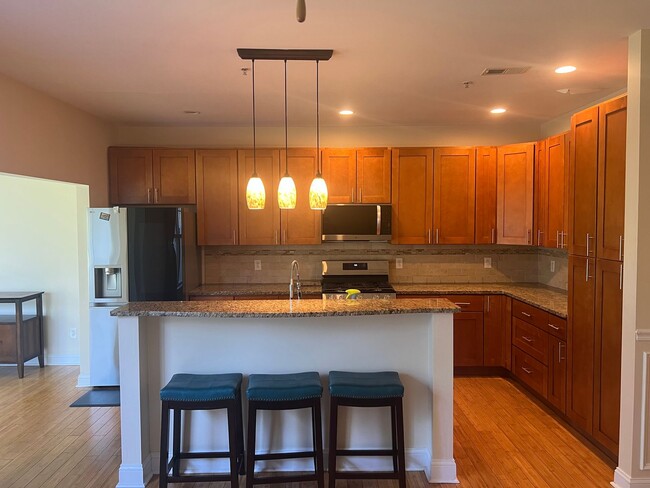 Building Photo - Carriage Style Townhome Now Available in W...