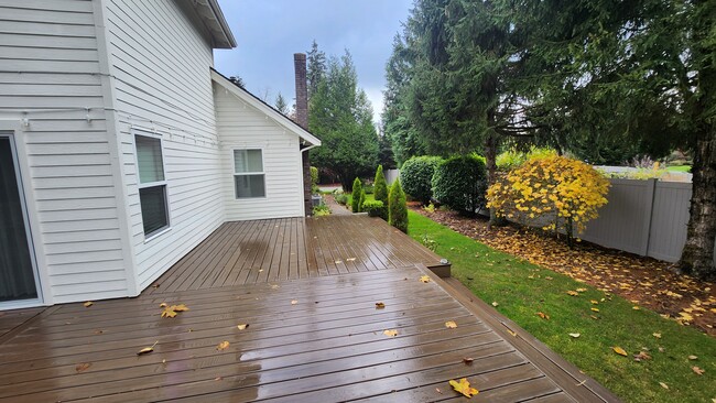 Deck wraps around side of house for extra space to use - 7409 245th Way NE