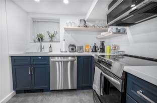 Kitchen with newer appliances including LG dishwasher - 1514 NW 70th St