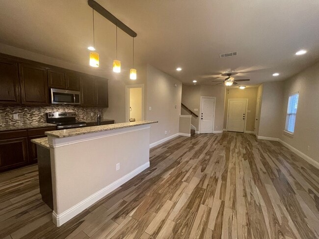 Primary Photo - 3/2.5 Townhome w/ STUNNING Open Floor Plan~ Stainless Steel Appliances*Custom Granite Counter top...