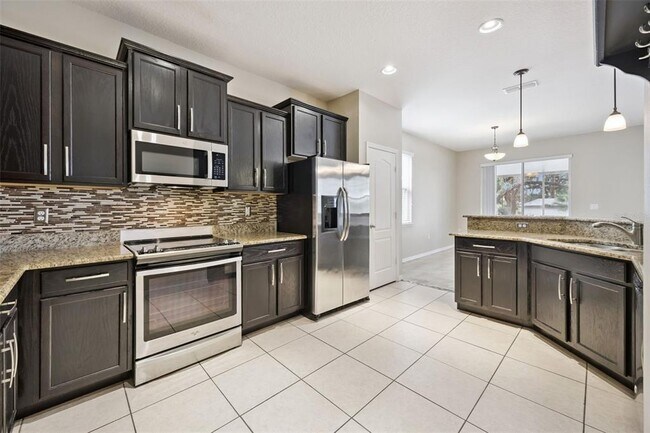 Building Photo - 1440 Scarlet Oak Loop