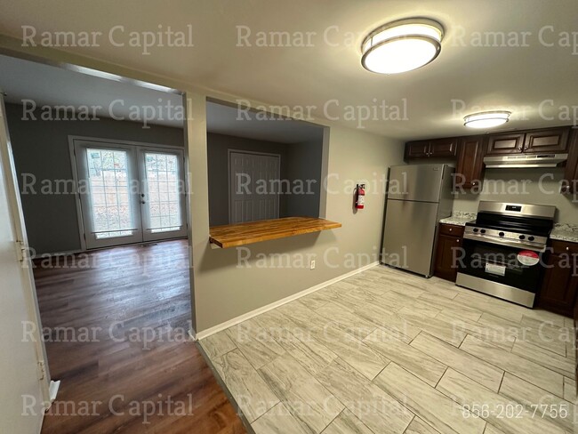 Building Photo - Stylish & Fully Furnished 3-Bedroom, 2-Bat...