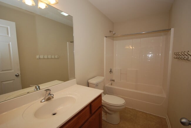 Building Photo - Oversized Executive Style Home with Finish...