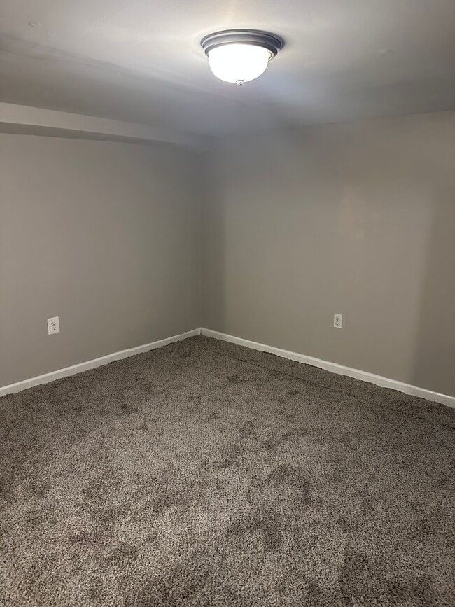 Building Photo - Spacious, Newly Renovated Home! Central Air! Finished Basement! W/D! Double Level Rear Deck! Avai...