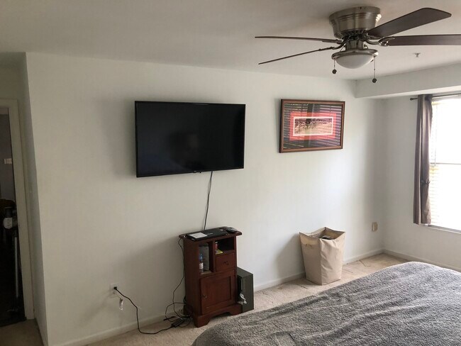 Building Photo - 7518 Snowpea Court, Unit E