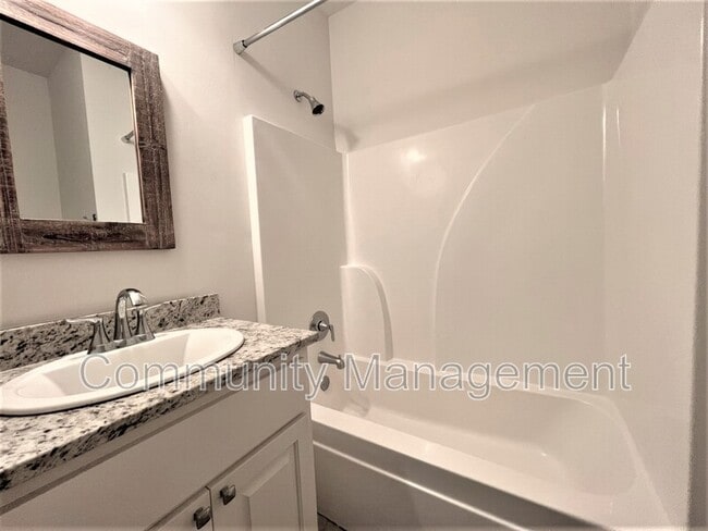 Building Photo - 7677 River Ridge Dr