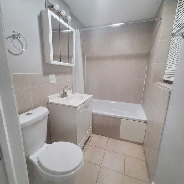 Building Photo - 7527 S Colfax Ave