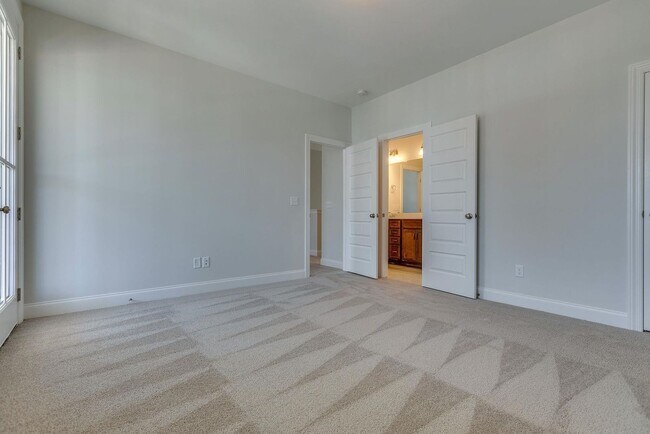 Building Photo - Welcome to your dream home in desirable Tollgate Village!