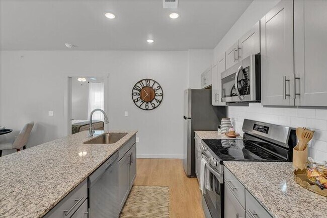 Building Photo - Step Right Up — Move In for Just $99 When You Sign by 8/31! | Brand-New 2-Bed, 2-Bath Apartments ...