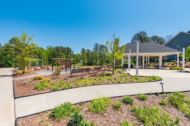 Building Photo - End unit townhome loaded with upgrades close to RTP! Available: Now