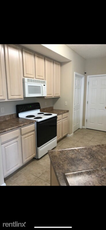 Building Photo - 2 br, 1 bath Condo - 3665 Lilac Lane 1 Unit 1