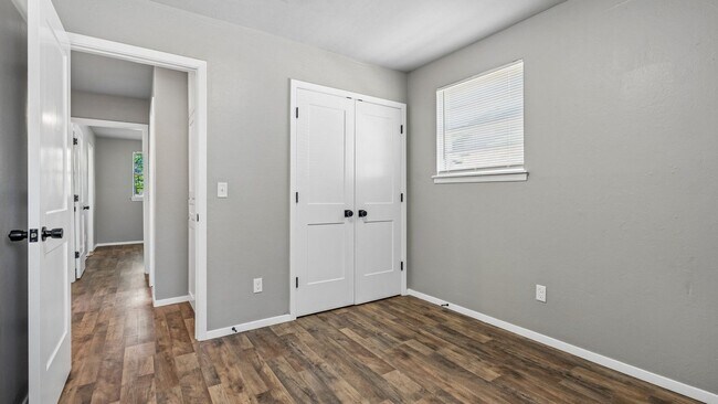 Building Photo - Charming 3 Bedroom Home +BONUS Room with Spacious Backyard