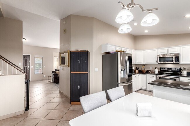 Building Photo - The Search is Over! 3-Bedroom, 2.5 baths with Refreshing Fenced Play Pool!