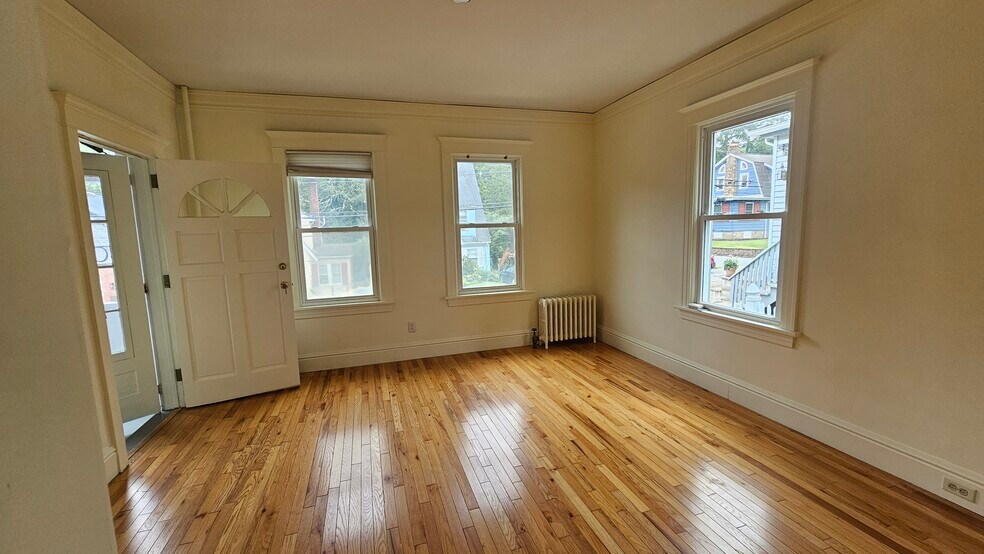 Living room facing front door - 133 Western Ave