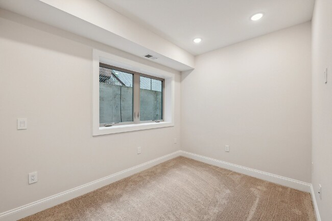 Building Photo - "NEW CONSTRUCTION 3-Bed Condo with Granite...