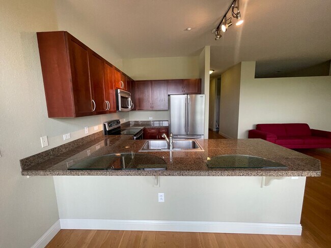 Building Photo - Stylish & Spacious 2-Bedroom Loft-Style Re...