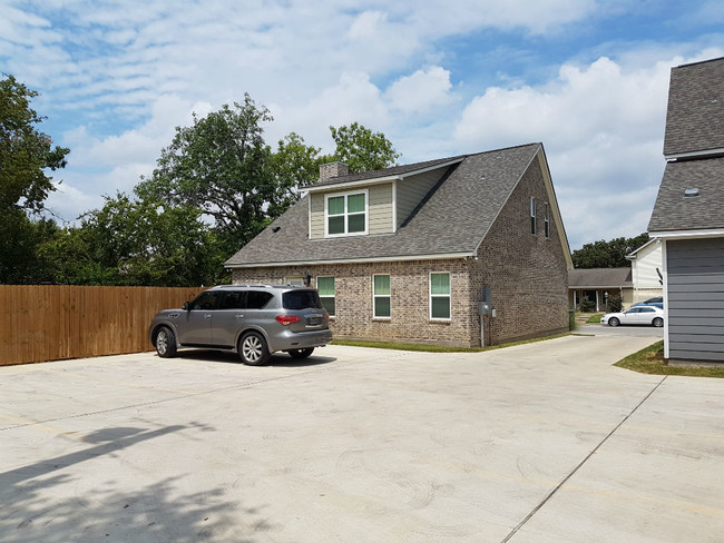 Ample parking off the street in back of the house. Space for 5 full-size vehicles and no double parking. - 113 Ehlinger Dr